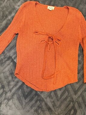 Women's Ribbed  knit Burnt Orange/rust. Cropped with gold ring and cut outs